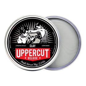 UPPERCUT DELUXE open jar displaying thick clay texture for styling