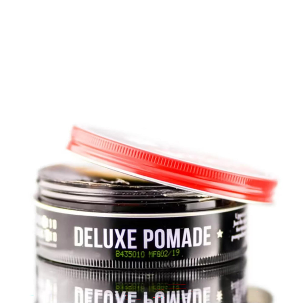 UPPERCUT DELUXE in barbershop setting illustrating professional use and reliability
