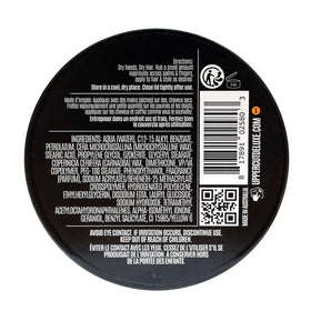 UPPERCUT DELUXE on bathroom counter in lifestyle scene conveying refined grooming ritual