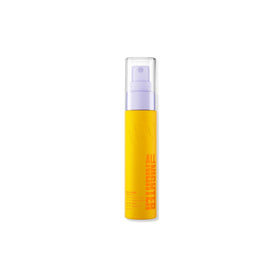 Urban Decay front bottle showing glow finish and travel size benefit