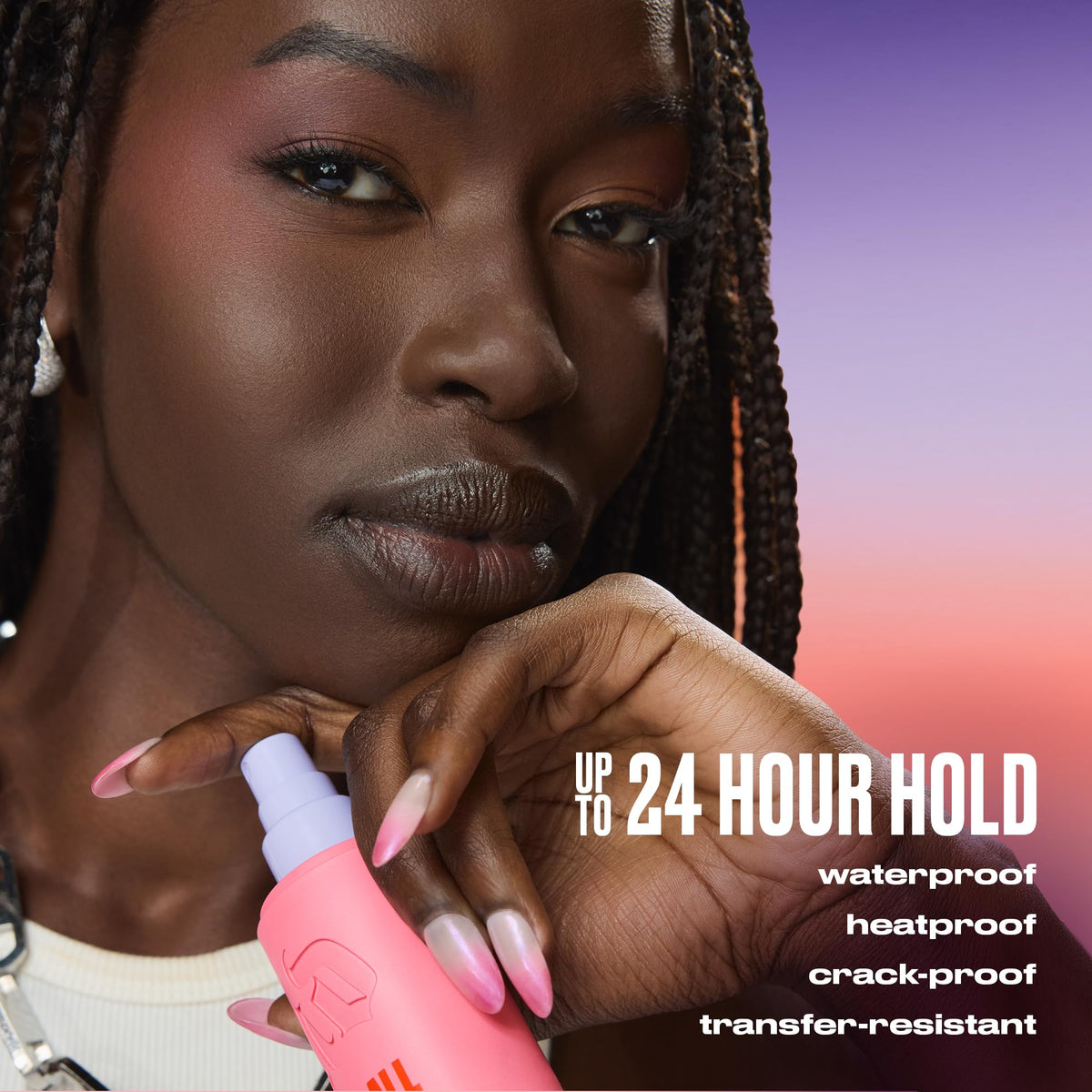Urban Decay bottle held in hand illustrating 1 fl oz travel size and carry-on convenience