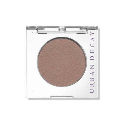 URBAN DECAY compact front view showing shade and sleek casing for easy travel