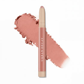 Urban Decay front packaging showing Exposed dusty rose and easy portability