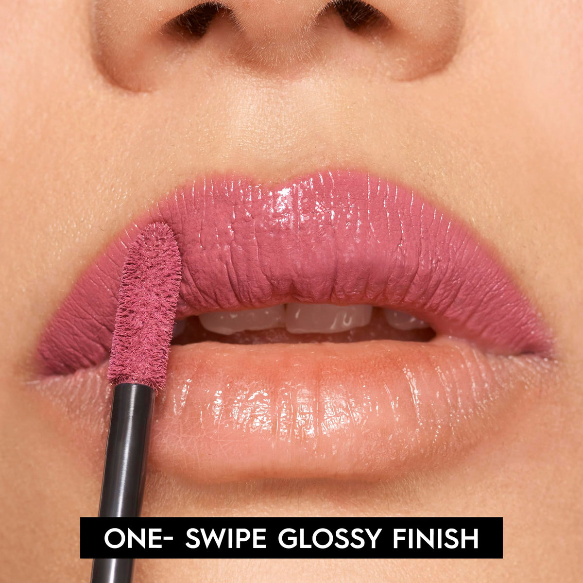 Urban Decay Vice Lip Bond worn on lips demonstrating glossy finish and longwear benefit during wear
