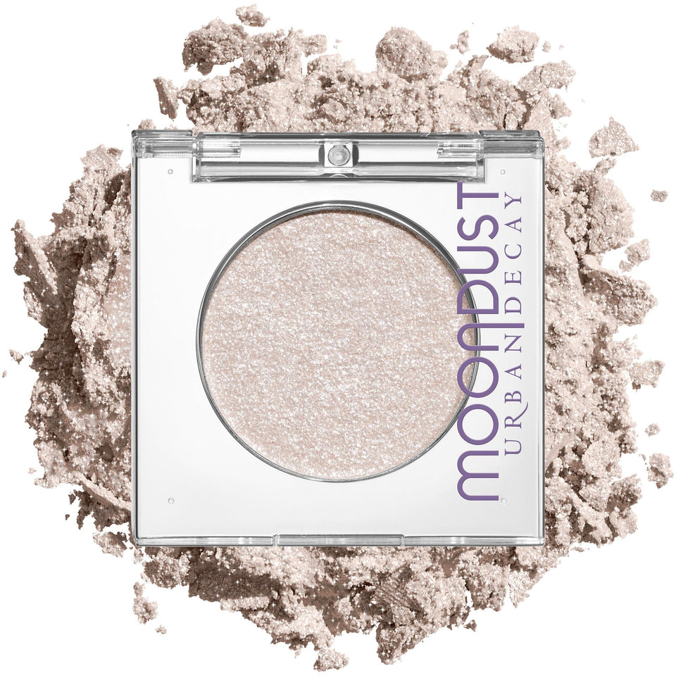 Urban Decay Moondust front pan showing compact packaging and sparkly finish benefits long-lasting shine