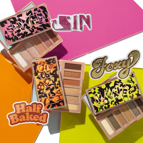 URBAN DECAY palette next to smartphone showing compact travel-friendly size