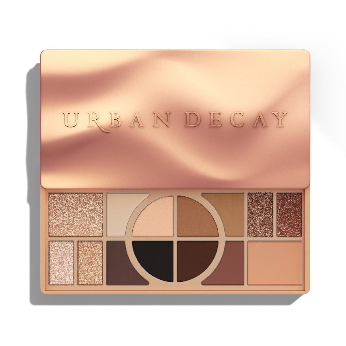 Urban Decay naked shaped open palette showing 14 warm shades and organized layout for easy use