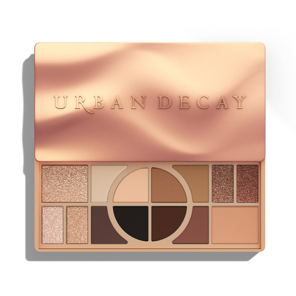 Urban Decay naked shaped open palette showing 14 warm shades and organized layout for easy use