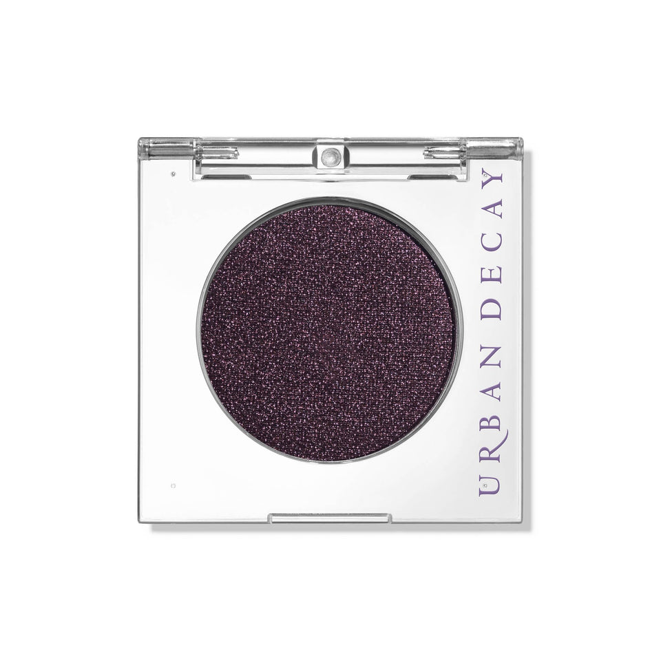 Urban Decay Ride front pan showing deep brown shimmer and purple shift for bold color