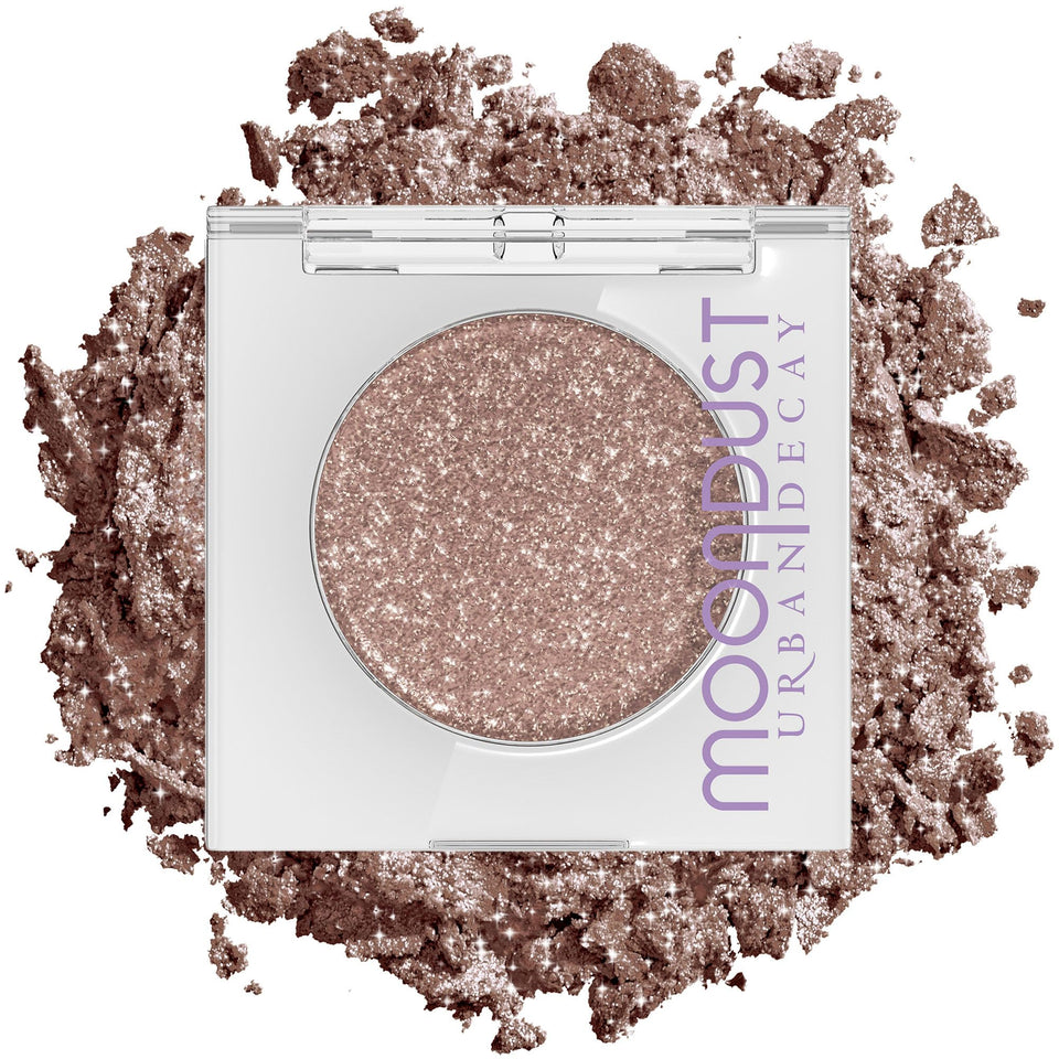 Urban Decay Space Cowboy front pan showing champagne-silver sparkle for intense shine