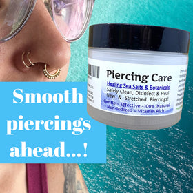 Urban ReLeaf soaking solution held against an ear piercing for calm