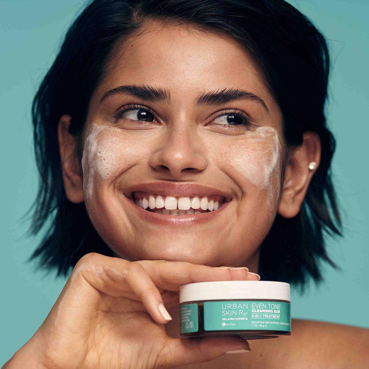 Urban Skin Rx bar producing rich lather to improve cleansing and treatment contact