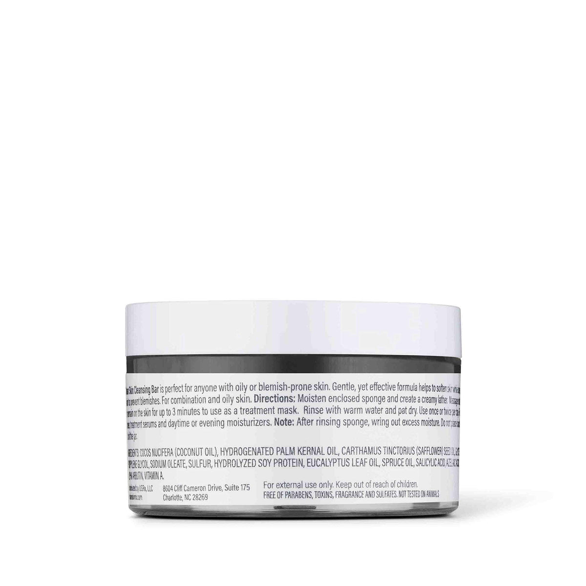 Urban Skin Rx bar on bath tray with eucalyptus leaf suggesting spa-like sensory benefit