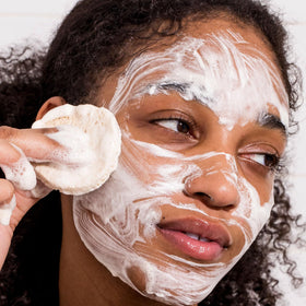 Urban Skin Rx foamy lather on face demonstrating clarifying action