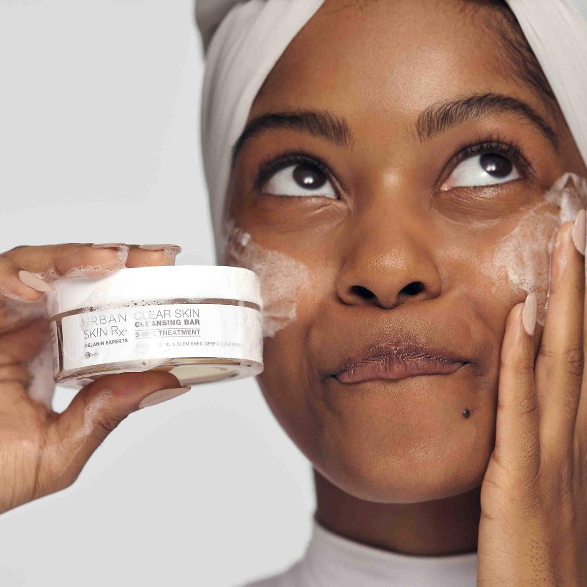 Urban Skin Rx sponge creating creamy lather for easy application