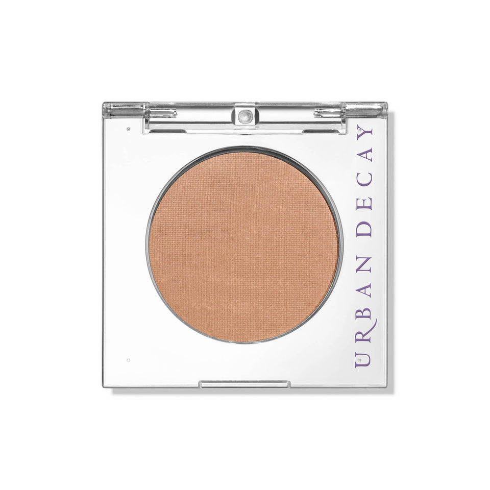 URBAN DECAY front compact shot showing Fix warm beige and sleek packaging