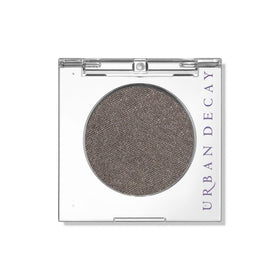URBAN DECAY Mushroom front pan showing gunmetal shimmer and compact finish benefits