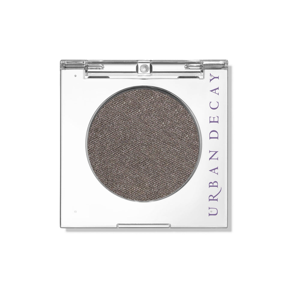 URBAN DECAY Mushroom front pan showing gunmetal shimmer and compact finish benefits