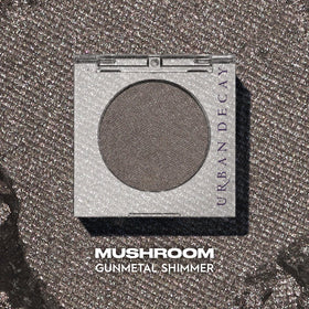 URBAN DECAY Mushroom swatch on arm demonstrating strong pigment payoff benefit