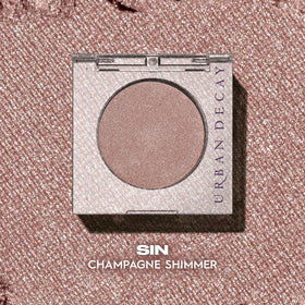 URBAN DECAY sin brush dampened to intensify metallic sheen and longevity