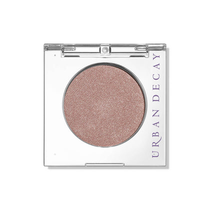 URBAN DECAY sin front compact showing champagne shimmer and travel-friendly design