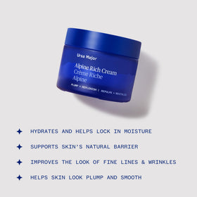 Ursa Major cream being applied to cheek showing fast-absorbing moisture benefit