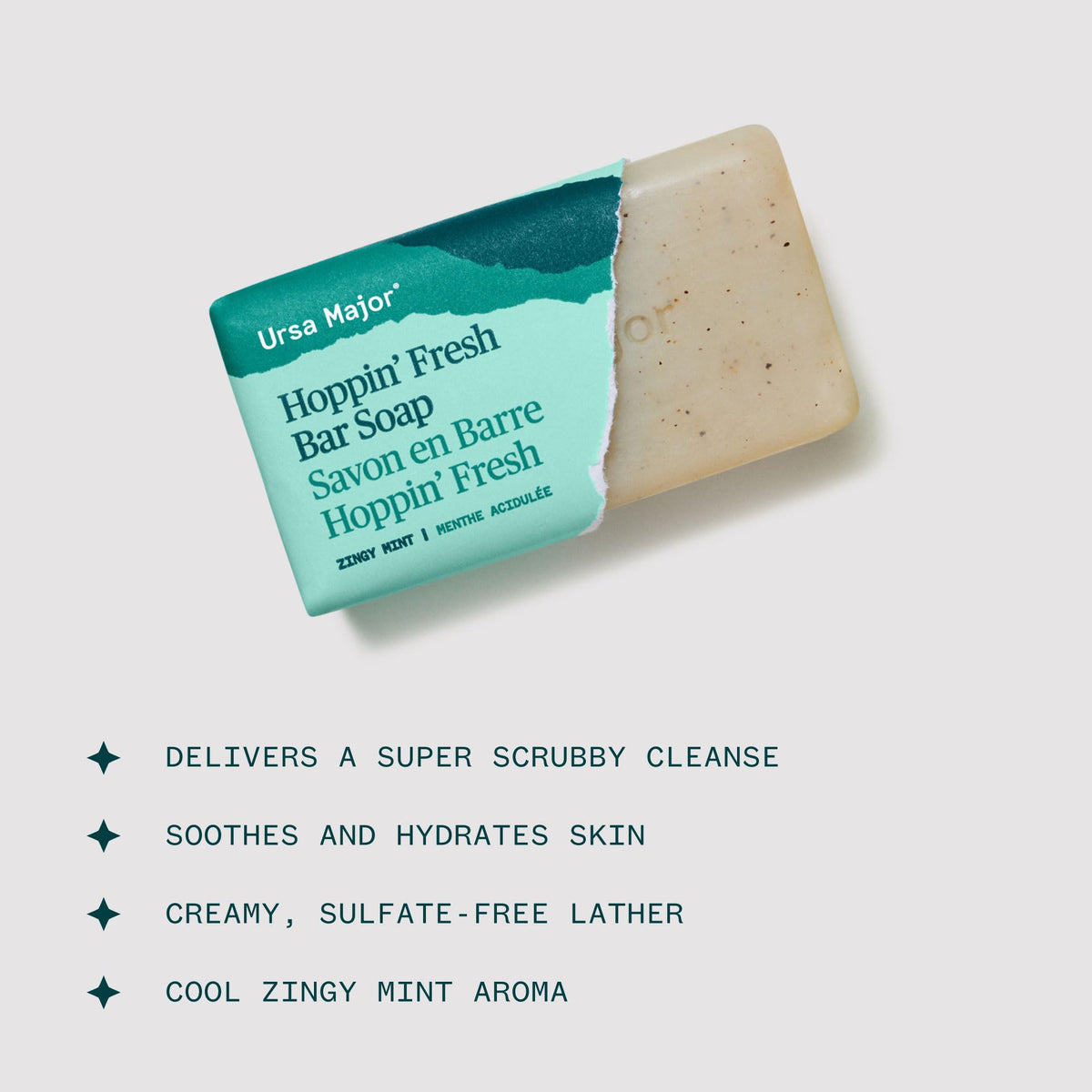 Ursa Major lather in hand demonstrating rich foam and gentle cleansing benefit