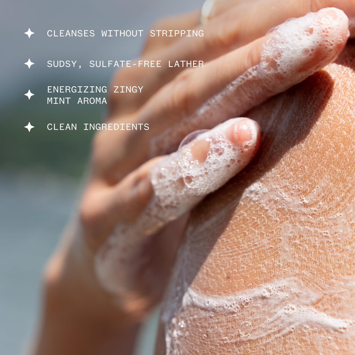 Ursa Major gel texture pouring to show creamy lather and gentle cleanse