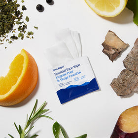 Ursa Major wipe being used on face after workout showing refresh and hydrate benefit