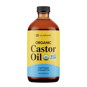 Us Naturals front glass bottle showcasing organic castor oil and sustainable design