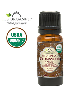 US Organic cedarwood oil pouring from dropper for precise dosing benefits