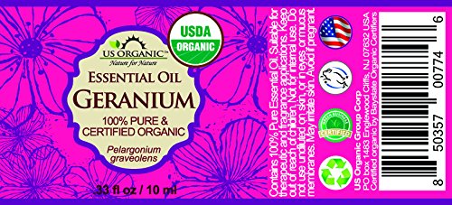 US Organic amber bottle beside measuring scale showing compact 10 ml size
