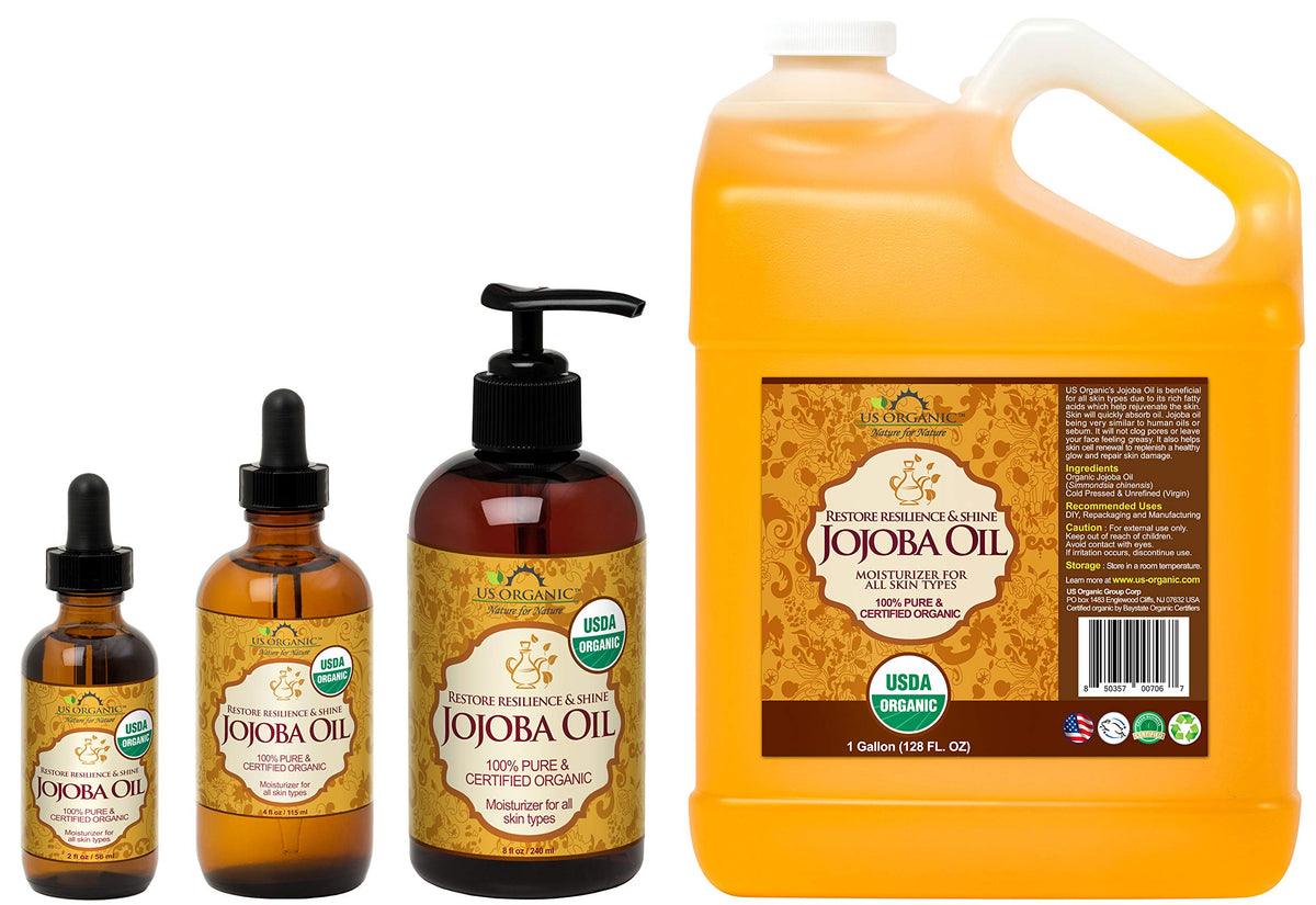 US Organic smoothing jojoba oil into hair to reduce frizz and add shine