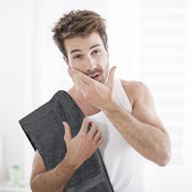Utopia Towels neatly folded stack showing space-saving storage benefit