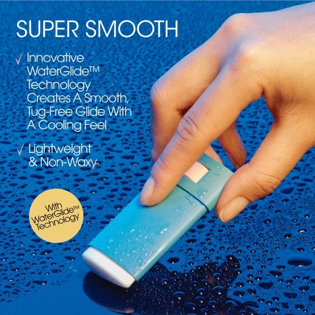 VACATION stick held in hand demonstrating compact travel size and portability