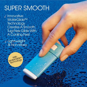 VACATION stick held in hand demonstrating compact travel size and portability