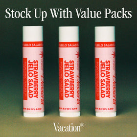 VACATION closeup of balm applied on lips showing subtle transparent sheen and hydration