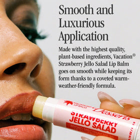 VACATION lip balm held next to a hand to show compact travel-friendly size and convenience