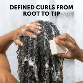 VALITIC shampoo bar texture close-up highlighting creamy solid formula and moisture