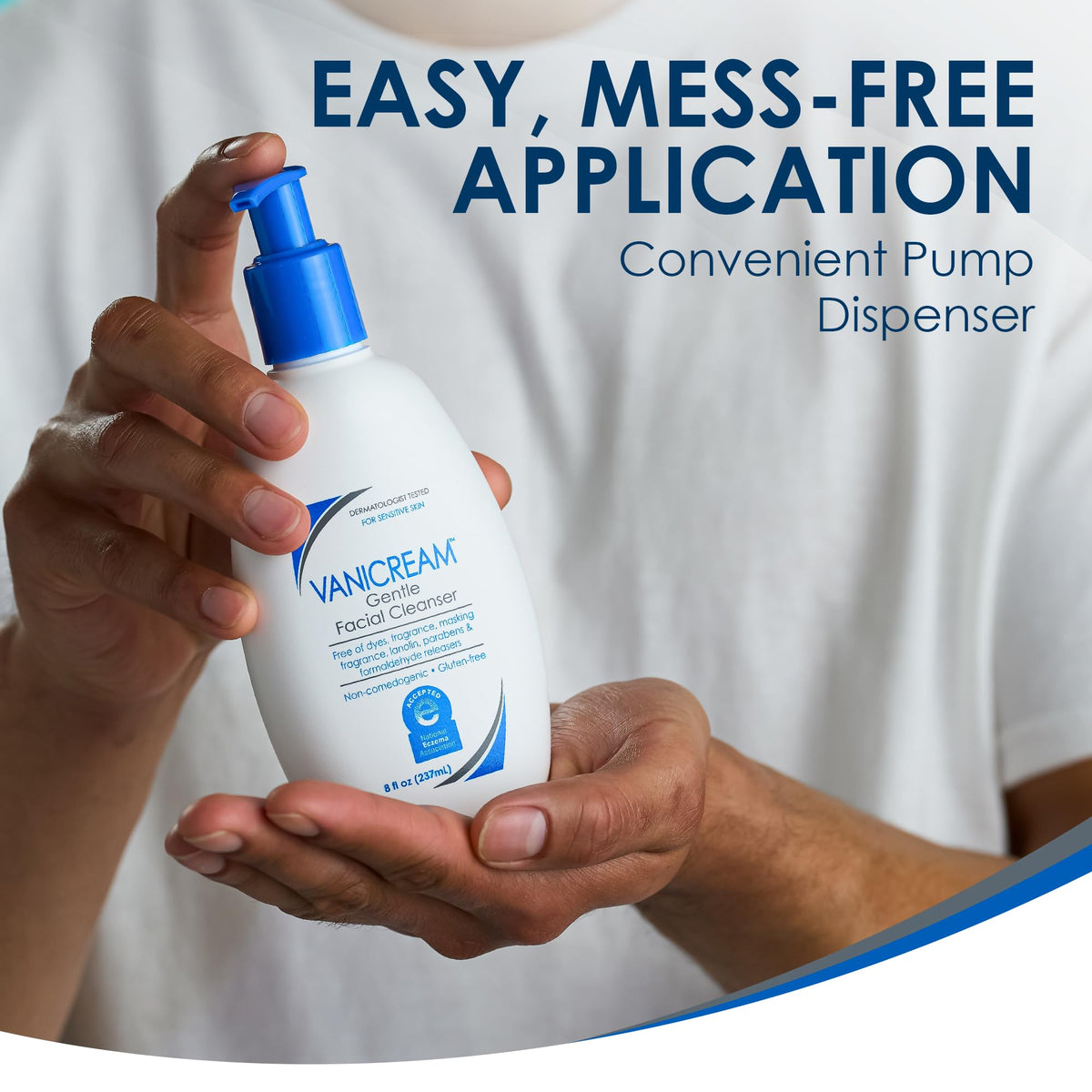 Vanicream bottle beside a hand to show 8 fl oz scale and portability
