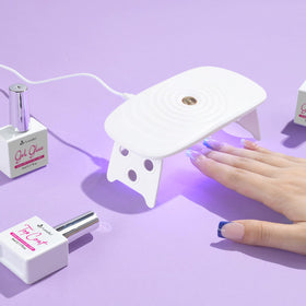 Vansiho builder gel and top coat bottles demonstrating glossy finish