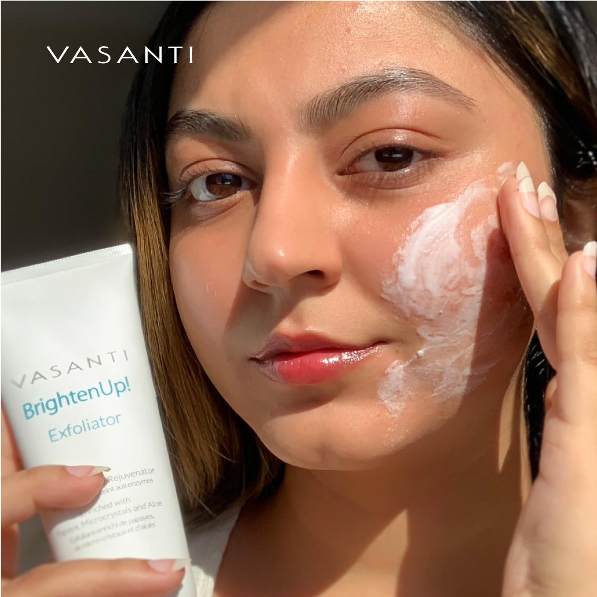 VASANTI being applied to cheek demonstrating gentle massage and instant smoothing benefit