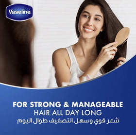 Label close-up on Vaseline bottle highlighting ingredients and use