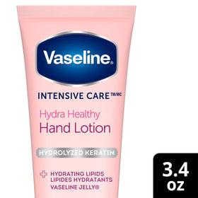 Vaseline hand cream on a bathroom counter illustrating daily moisturizing routine