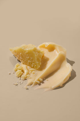Vaseline label detail showing cocoa butter ingredient and nourishing benefit