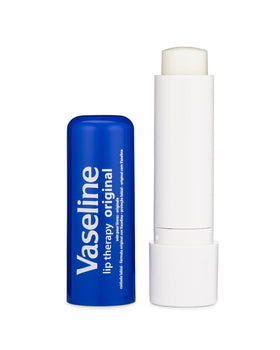 Vaseline beside coin for size comparison and travel-friendly benefit
