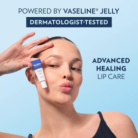 Holding Vaseline lip therapy tube to show portable moisture protection
