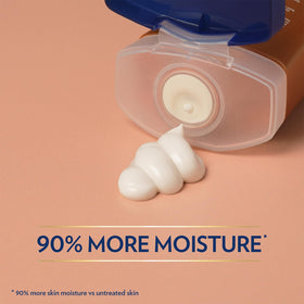 Vaseline lotion texture spread on forearm demonstrating fast-absorbing, non-greasy hydration