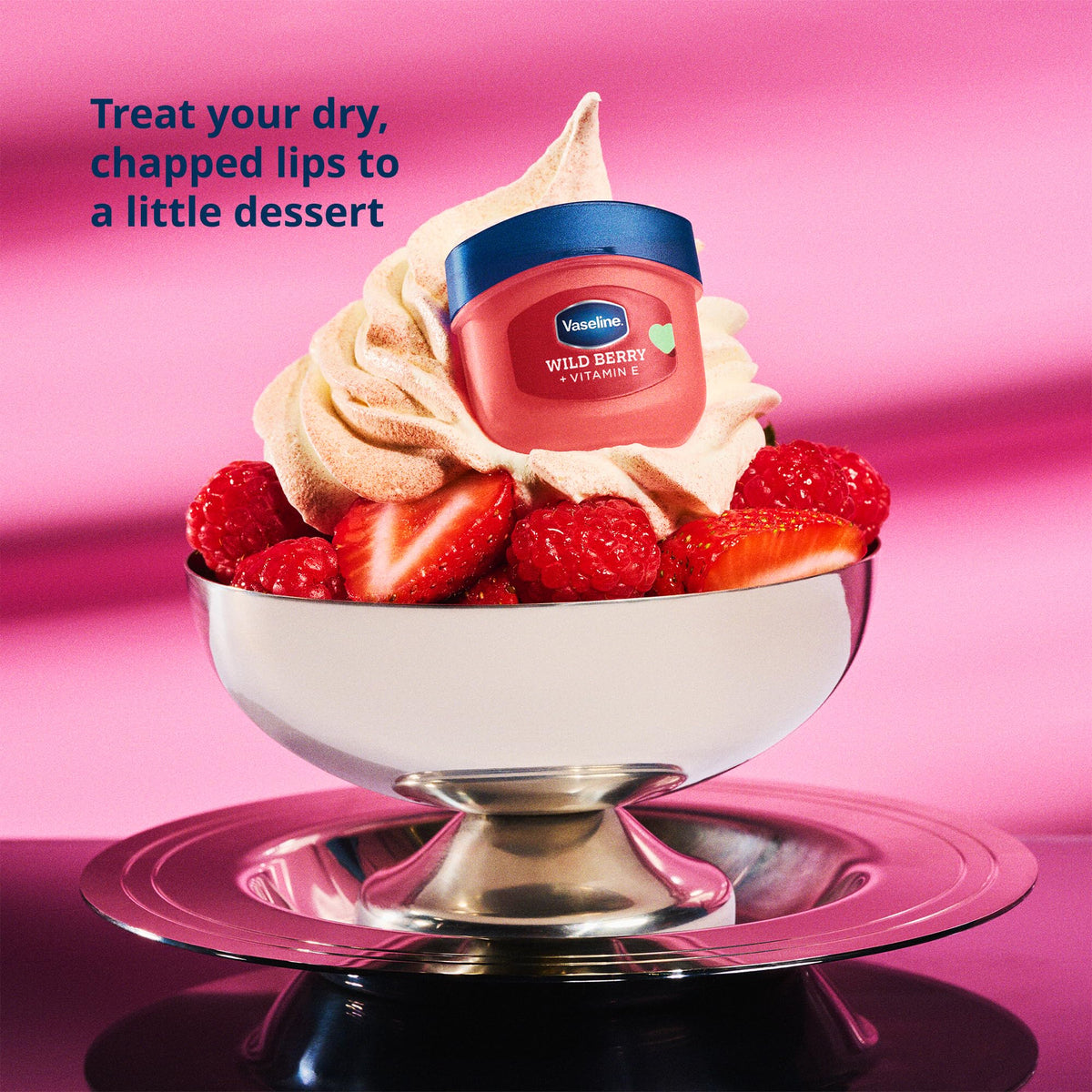 Vaseline Wild Berry applied on lips showing glossy tint and quick moisture benefit
