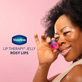 Vaseline rosy lips on desk lifestyle conveying easy daily touch-ups benefit